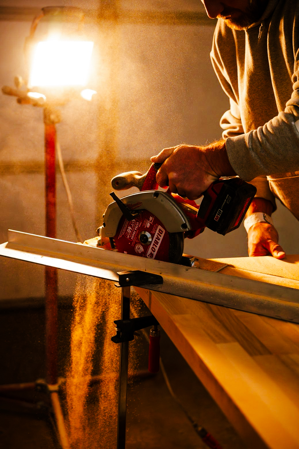 Craftsman at work creating custom wood surfaces